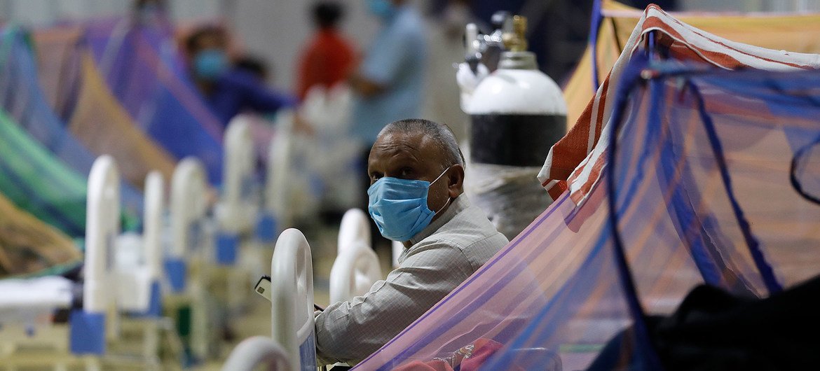 Patients receive treatment in the COVID-19 care centre at the Commonwealth Games Village (CWG) in New Delhi, India. Patients receive treatment in the COVID-19 care centre at the Commonwealth Games Village (CWG) in New Delhi, India.