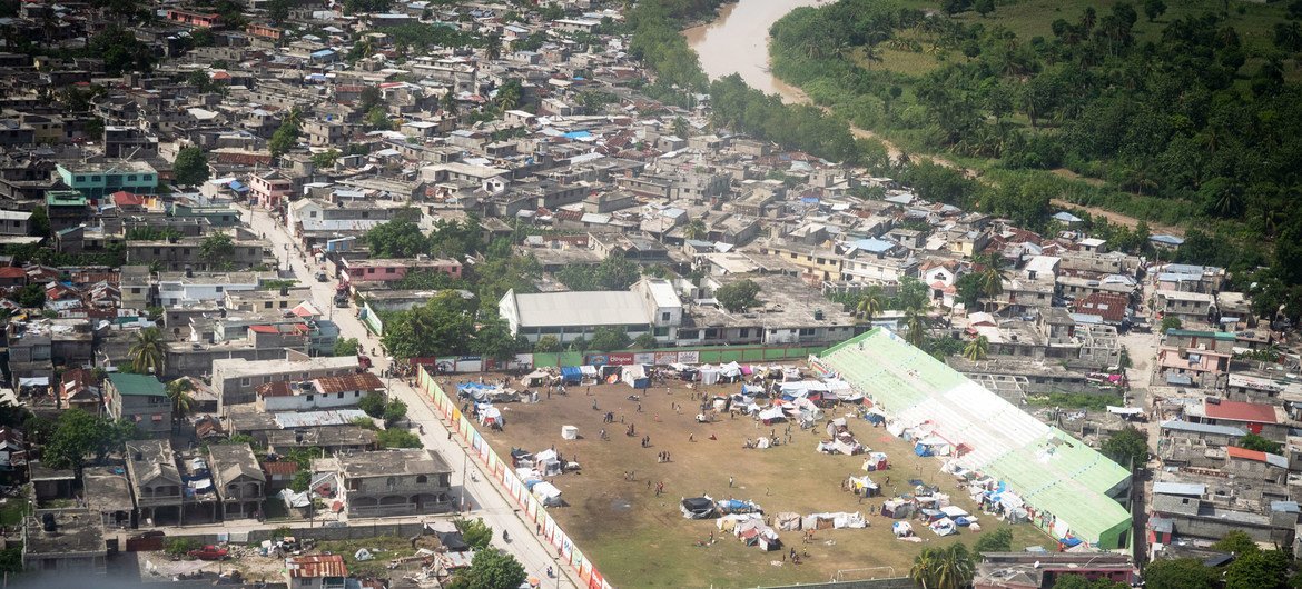 A sports field in Les Cayes is being used as a temporary camp for people displaced by the recent earthquake in Haiti. A sports field in Les Cayes is being used as a temporary camp for people displaced by the recent earthquake in Haiti.