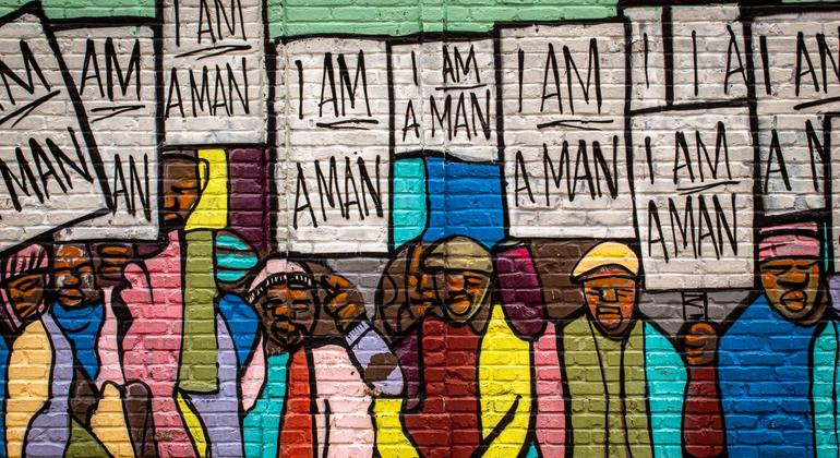 ABD'deki Sivil Haklar Hareketi sırasında Memphis, Tennessee'de gerçekleşen Ben Bir Adamım protestosunun duvar resmi.