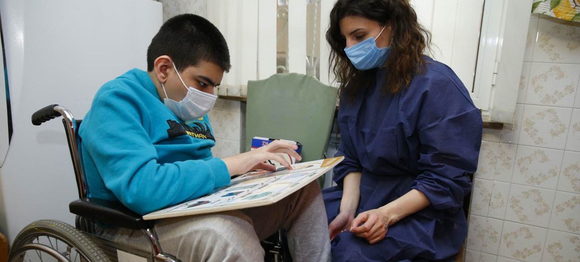 A disabled boy continues his education during the COVID-19 pandemic in Armenia. A disabled boy continues his education during the COVID-19 pandemic in Armenia.