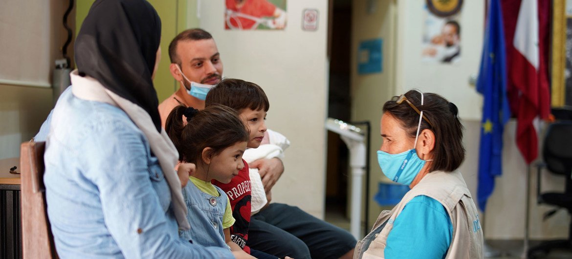 A UNICEF doctor treats a child just days after the explosion. A UNICEF doctor treats a child just days after the explosion.