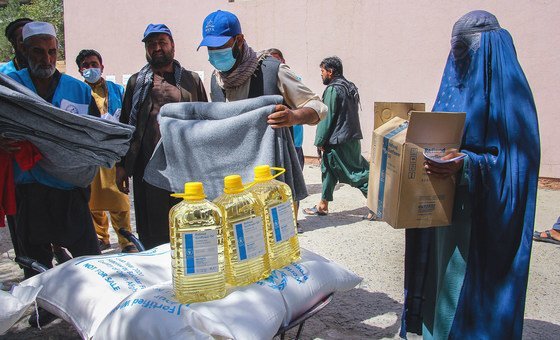 Food and blankets are handed out to people in need in Kabul, the capital of Afghanistan Food and blankets are handed out to people in need in Kabul, the capital of Afghanistan