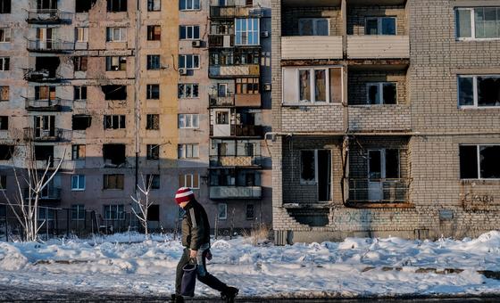 A child walks past a damaged building in eastern Ukraine. (FIle) A child walks past a damaged building in eastern Ukraine. (FIle)