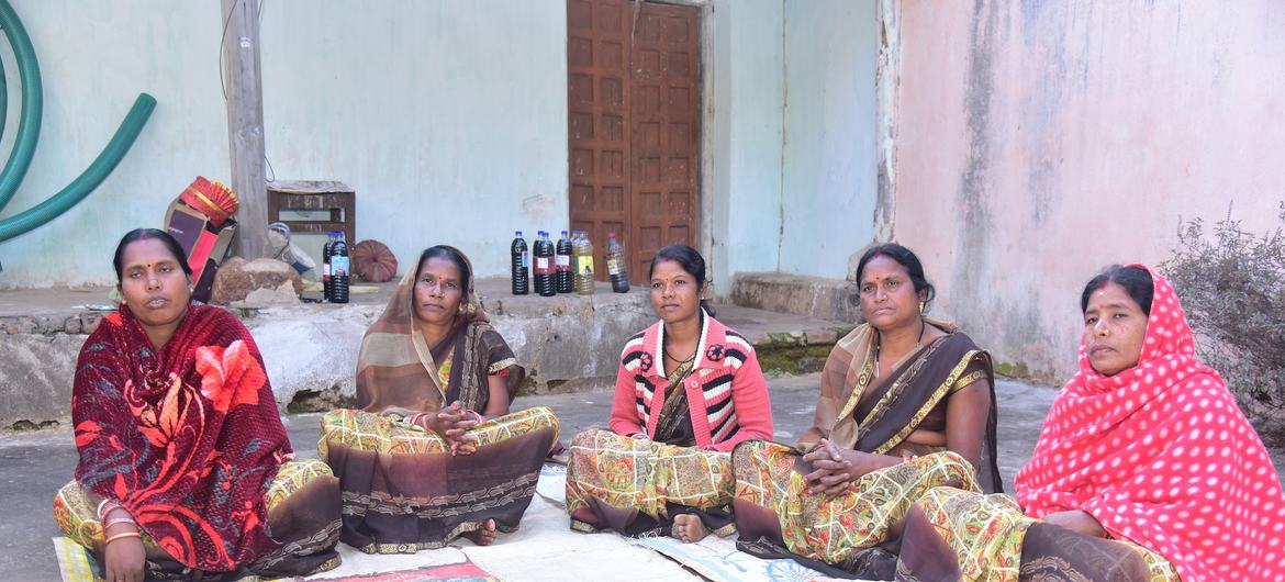 Self-help group memebers at bio-input unit. Self-help group memebers at bio-input unit.