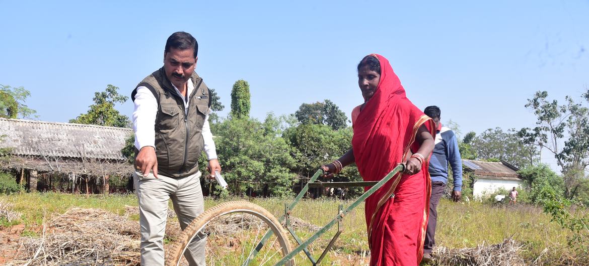 Subasa Mohanta with a cycle weeder. Subasa Mohanta with a cycle weeder.