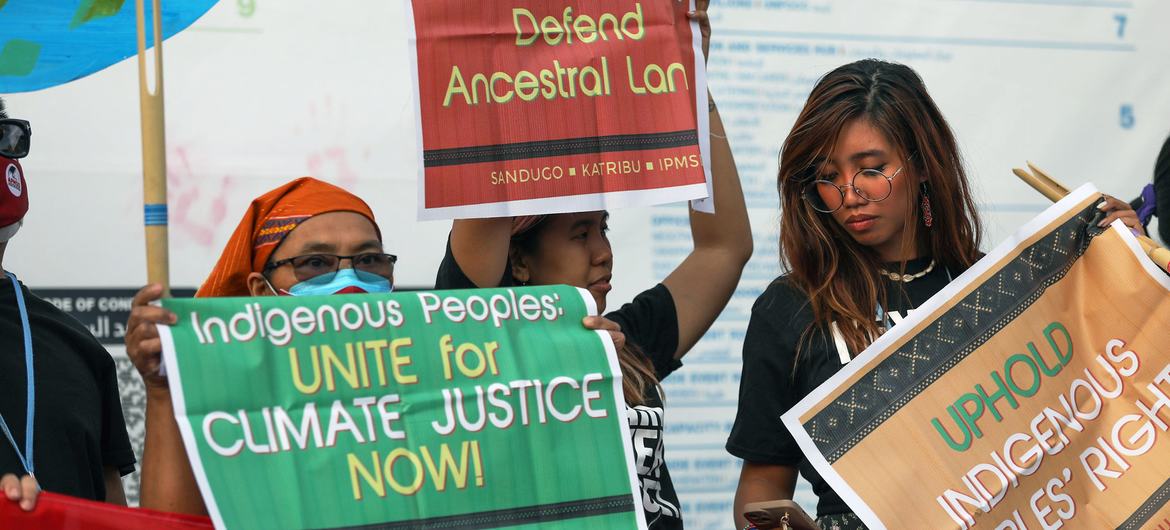 Indigenous activists protest at COP27. Indigenous activists protest at COP27.