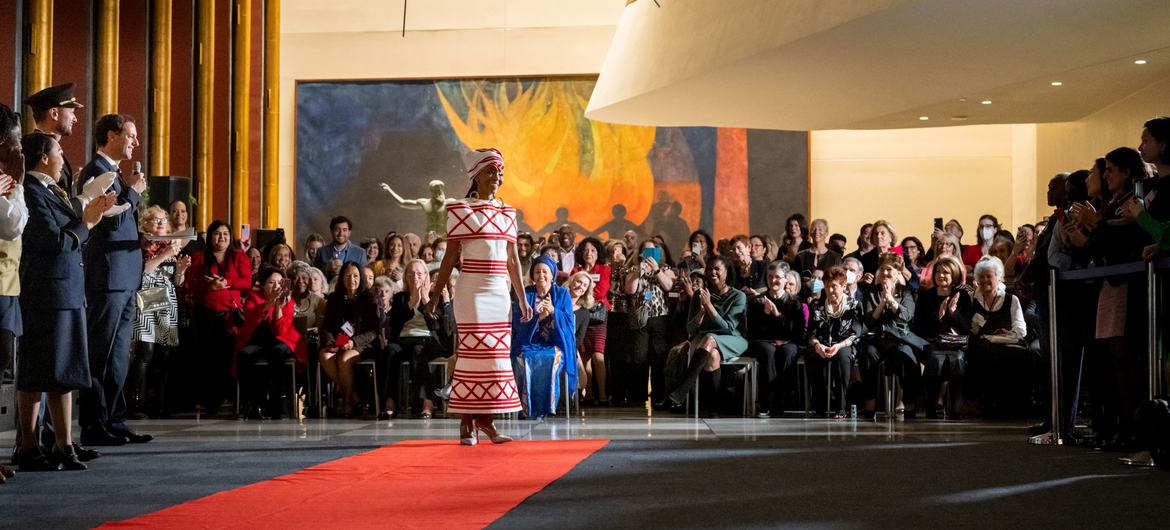 The UN Guided Tours unit celebrates its 70th anniversary with a fashion show of different uniforms worn over seven decades, as well as traditional outfits that showcase the diverse nationalities and backgrounds.