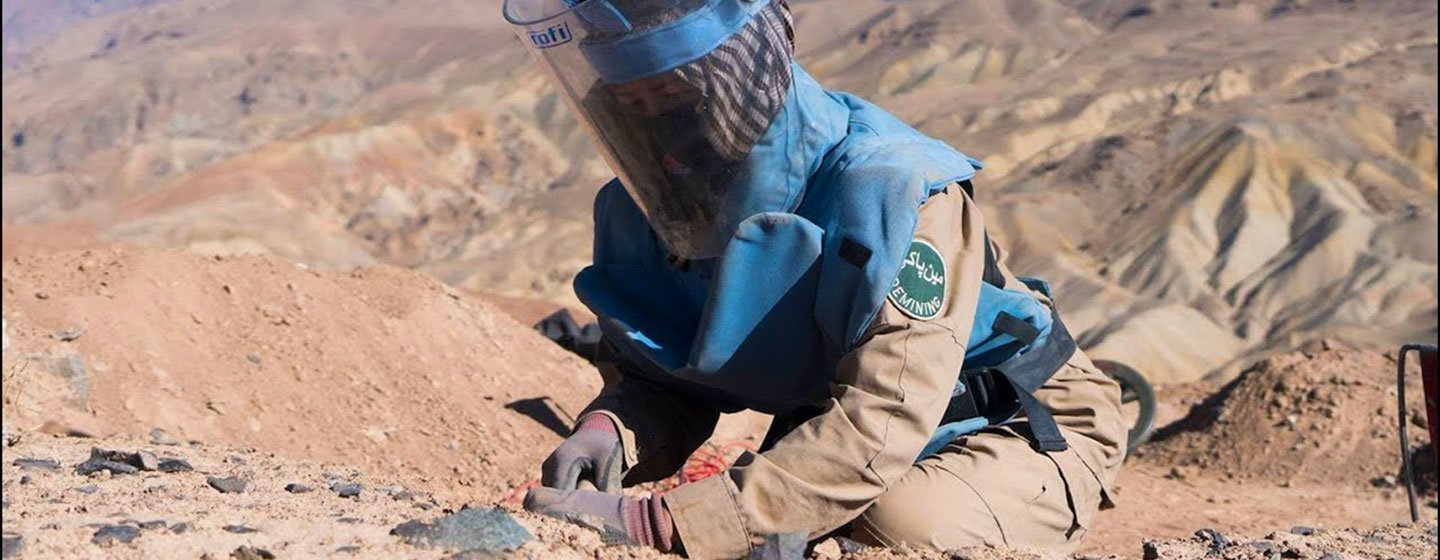 A female deminer at work in Bamyan, Afghanistan. A female deminer at work in Bamyan, Afghanistan.