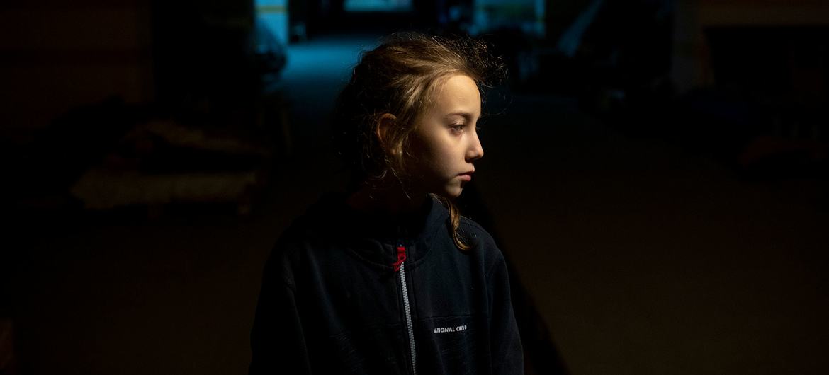 A 9-year-old girl stands in an underground car park in Kharkiv where she is sheltering with her parents during the conflict in Ukraine. A 9-year-old girl stands in an underground car park in Kharkiv where she is sheltering with her parents during the conflict in Ukraine.