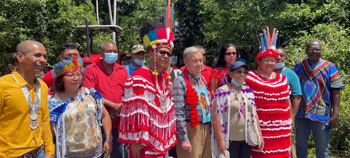 UN Secretary-General António Guterres (centre) meets with members of agricultural cooperatives led by indigenous women and men in Pierre Kondre- Redi Doti Village, in Suriname's tropical forest belt. UN Secretary-General António Guterres (centre) meets with members of agricultural cooperatives led by indigenous women and men in Pierre Kondre- Redi Doti Village, in Suriname's tropical forest belt.