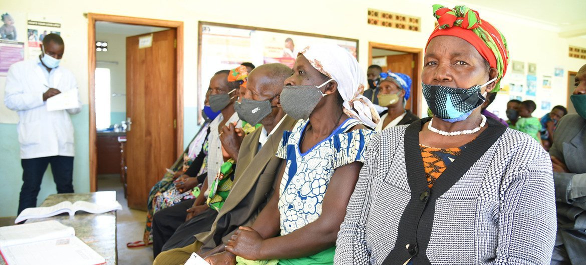 Patients wait for their COVID-19 vaccination at a health centre in Kabale District, Uganda. Patients wait for their COVID-19 vaccination at a health centre in Kabale District, Uganda.