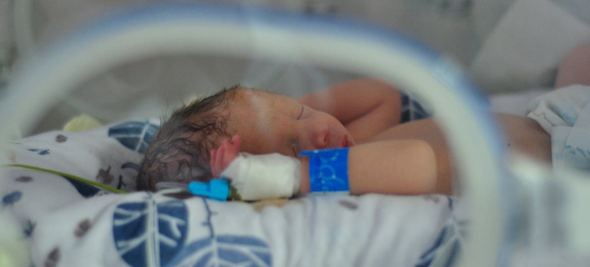 A newborn baby lies in an incubator at a maternity ward that was moved to the basement of a hospital in Kyiv, Ukraine. A newborn baby lies in an incubator at a maternity ward that was moved to the basement of a hospital in Kyiv, Ukraine.