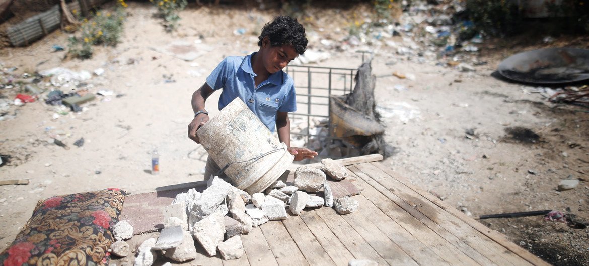 Thirteen-year-old boy in Palestine collects rubble near Gaza City, which he transports by donkey to the market to sell. (file) Thirteen-year-old boy in Palestine collects rubble near Gaza City, which he transports by donkey to the market to sell. (file)