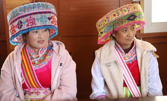 Women of the Lisu ethnic minority, from Yunnan province, China, in traditional dress. Women of the Lisu ethnic minority, from Yunnan province, China, in traditional dress.