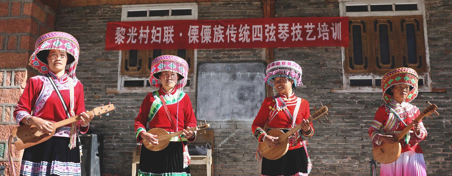 Women of the Lisu ethnic minority, from Yunnan province, China, in traditional dress. Women of the Lisu ethnic minority, from Yunnan province, China, in traditional dress.