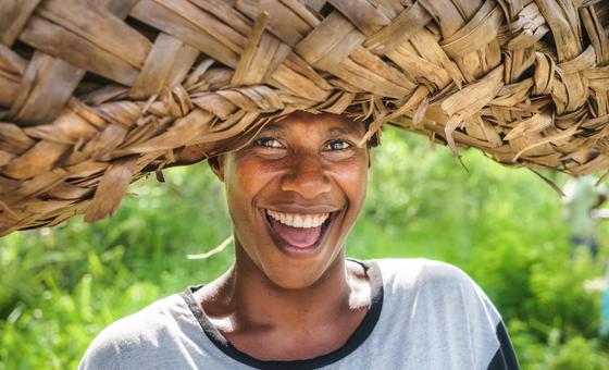 A woman coming back from a field in Port Vila, Vanuatu. A woman coming back from a field in Port Vila, Vanuatu.