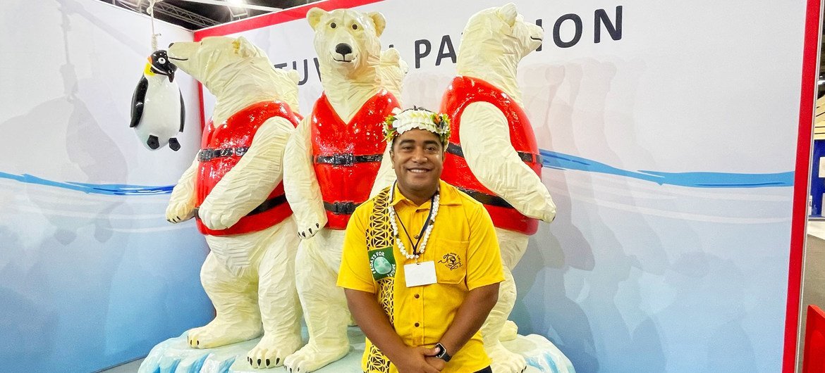 Bernard Ewekia, a student from Tuvalu, poses for a photo at his country’s COP26 pavilion at the Climate Conference in Glasgow, Scotland. Bernard Ewekia, a student from Tuvalu, poses for a photo at his country’s COP26 pavilion at the Climate Conference in Glasgow, Scotland.