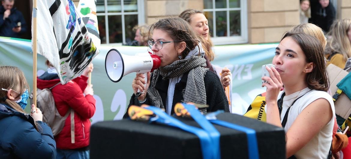In Glasgow, Scotland, people take part in a demonstration for climate action, led by youth climate activists and organized on the sidelines of the 2021 UN Climate Change Conference (COP26). In Glasgow, Scotland, people take part in a demonstration for climate action, led by youth climate activists and organized on the sidelines of the 2021 UN Climate Change Conference (COP26).
