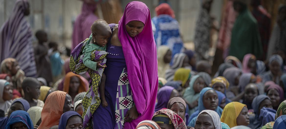 Internally displaced mothers and their children attend a WFP famine assessment in Borno State, Nigeria. Internally displaced mothers and their children attend a WFP famine assessment in Borno State, Nigeria.