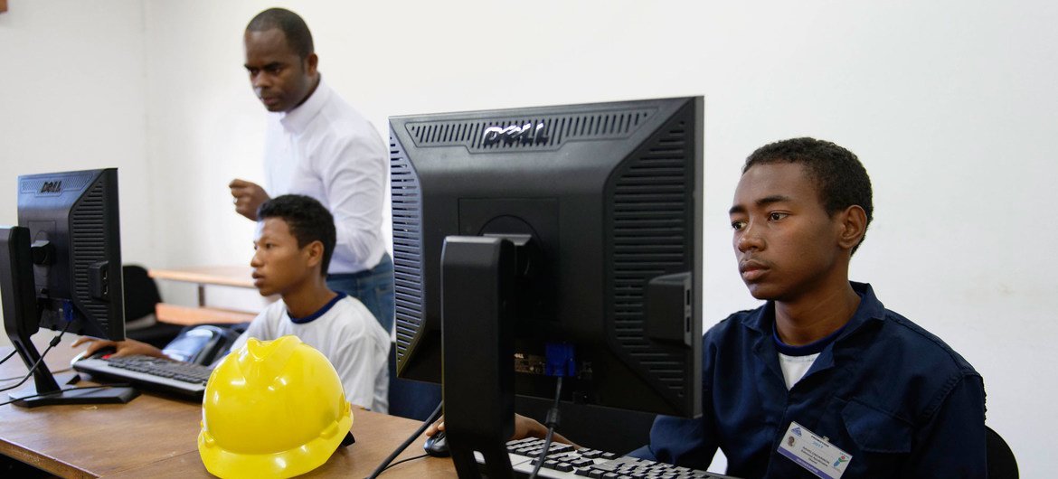 Young people in Madagascar receive technology training at a centre supported by the ILO. Young people in Madagascar receive technology training at a centre supported by the ILO.