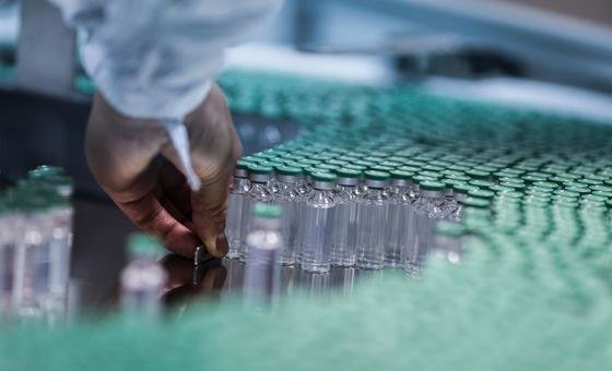 An employee works on the production line of a COVID-19 vaccine in India An employee works on the production line of a COVID-19 vaccine in India