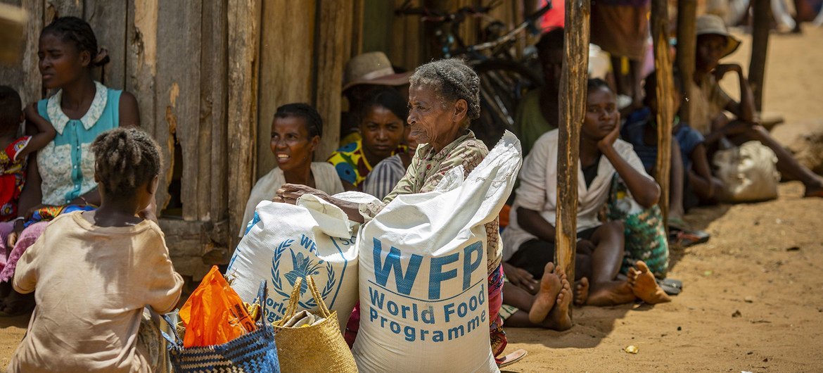 Residents in the drought affected communities of Ifotaka, southern Madagascar, collect food assistance provided by the UN World Food Progamme. Residents in the drought affected communities of Ifotaka, southern Madagascar, collect food assistance provided by the UN World Food Progamme.