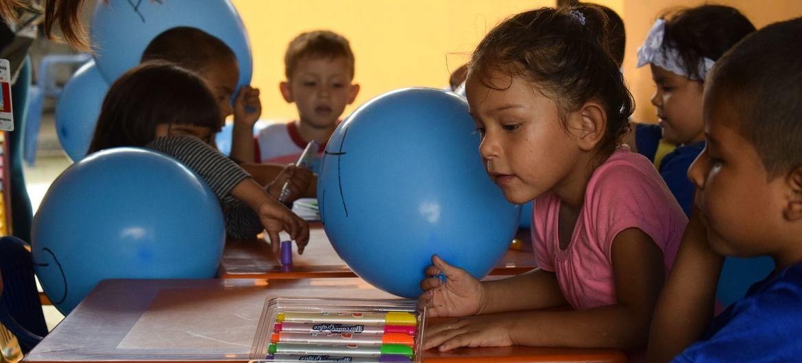 Children drawing in their classroom in the department of Arauca, Colombia. Children drawing in their classroom in the department of Arauca, Colombia.