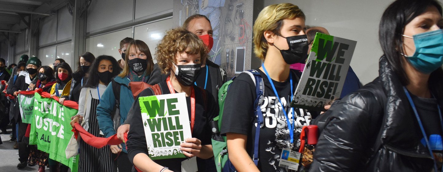 Civil organizations march inside the venue at the COP26 Climate Conference in Glasgow, Scotland, in a demonstration on the last day. Civil organizations march inside the venue at the COP26 Climate Conference in Glasgow, Scotland, in a demonstration on the last day.