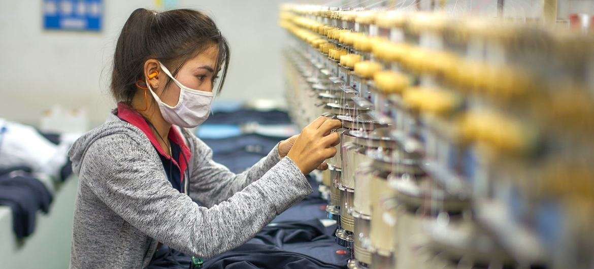 A female garment factory worker in Lao PDR. A female garment factory worker in Lao PDR.