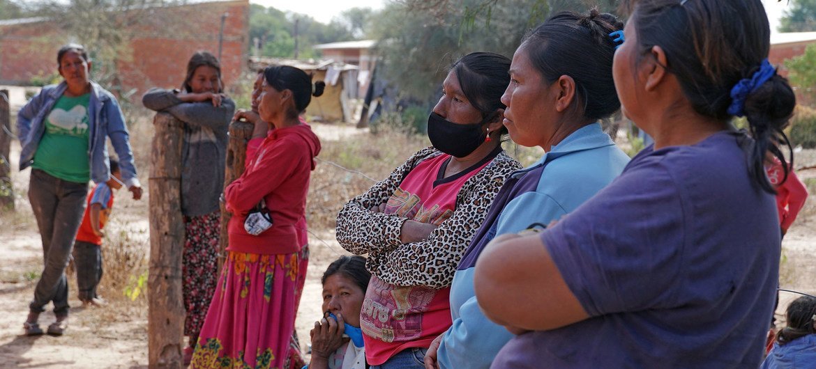 An indigenous community in Paraguay wait to receive their COVID-19 vaccination. An indigenous community in Paraguay wait to receive their COVID-19 vaccination.