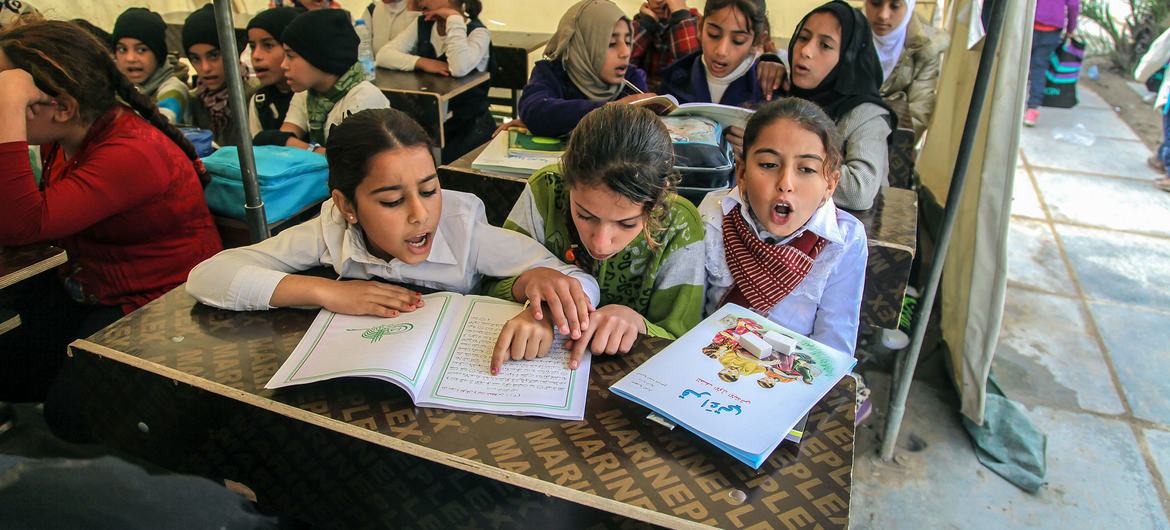 Displaced children in a classroom in Baghdad, Iraq. Displaced children in a classroom in Baghdad, Iraq.