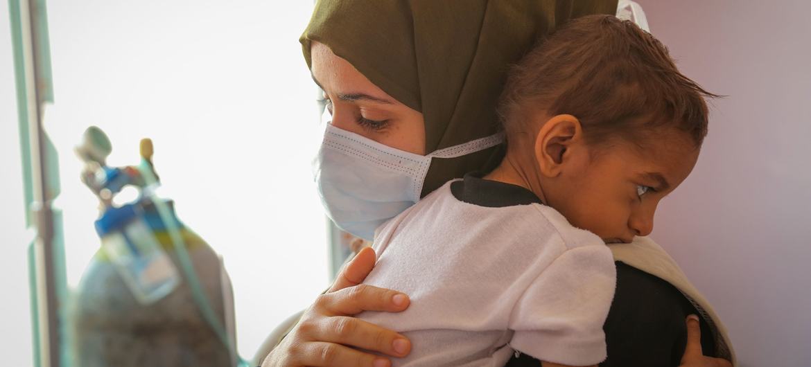An infant is treated for malnutrition at a hospital in Sana'a, Yemen. An infant is treated for malnutrition at a hospital in Sana'a, Yemen.