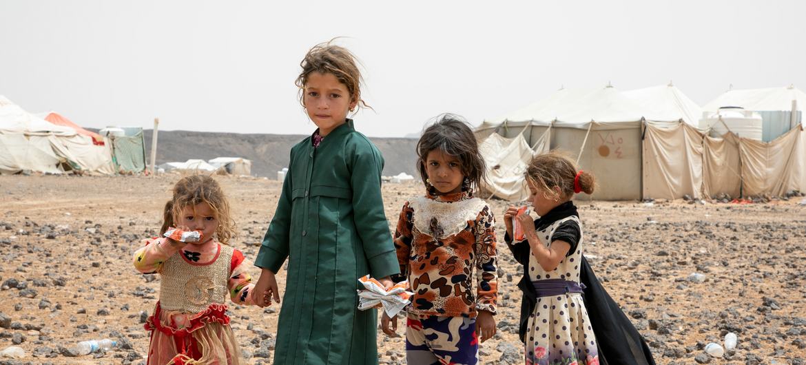 Young girls in a displaced persons camp near Marib city in Yemen. Young girls in a displaced persons camp near Marib city in Yemen.