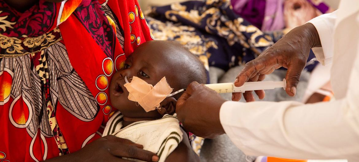 A 6-month-old, malnourished boy in South Sudan receives milk through a feeding tube. A 6-month-old, malnourished boy in South Sudan receives milk through a feeding tube.