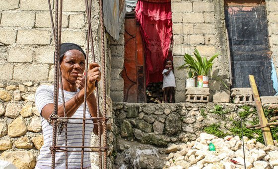 A displaced grandmother and child in Tabarre Issa, Port-au-Pince, Haiti. A displaced grandmother and child in Tabarre Issa, Port-au-Pince, Haiti.