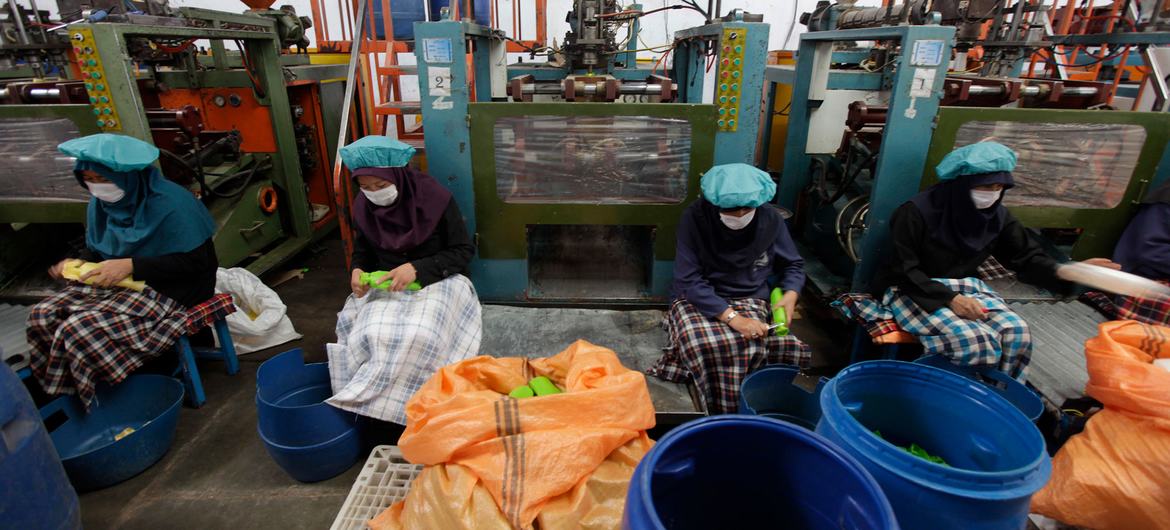 Women workers at a factory in western Herat province in Afghanistan. Women workers at a factory in western Herat province in Afghanistan.