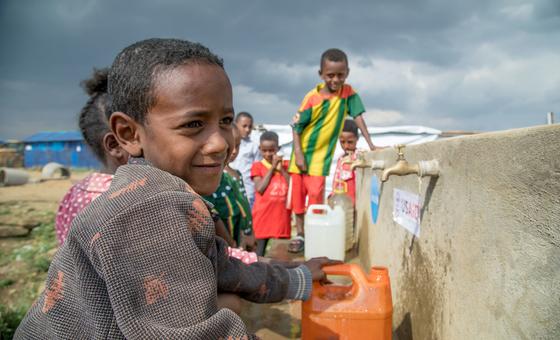 Displaced children collect water in Mekelle, capital of Tigray Region, Ethiopia. Displaced children collect water in Mekelle, capital of Tigray Region, Ethiopia.