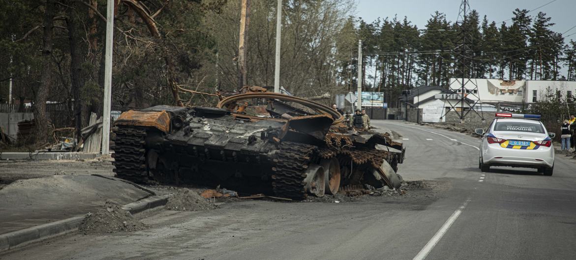 A destroyed tank is abandoned on the road to Bucha, Ukraine. A destroyed tank is abandoned on the road to Bucha, Ukraine.