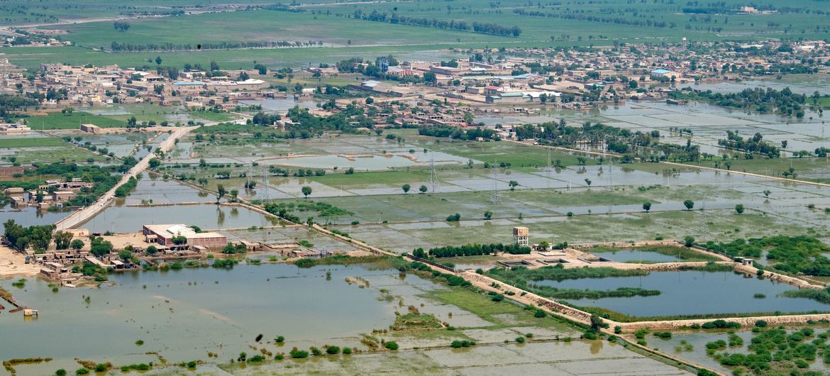 An aerial view of the devastated landscape shot during Secretary-General António Guterres' solidarity visit to Pakistan where he witnessed the impact of the floods in the provinces of Sindh and Balochistan. An aerial view of the devastated landscape shot during Secretary-General António Guterres' solidarity visit to Pakistan where he witnessed the impact of the floods in the provinces of Sindh and Balochistan.