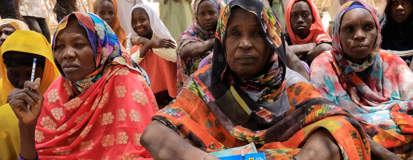 Women attend literacy courses at the local school in Umm al Khairat, East Darfur, Sudan. Women attend literacy courses at the local school in Umm al Khairat, East Darfur, Sudan.