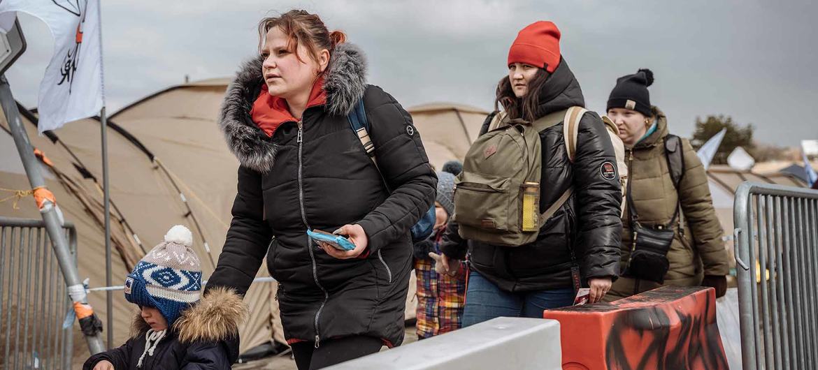 Ukrainian refugees arrive at the Medyka border point in Poland. Ukrainian refugees arrive at the Medyka border point in Poland.