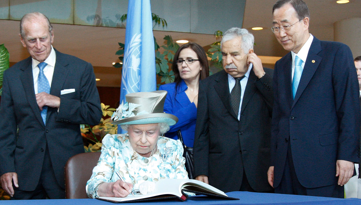 Queen Elizabeth II of United Kingdom Signs Guestbook at UN Headquarters
