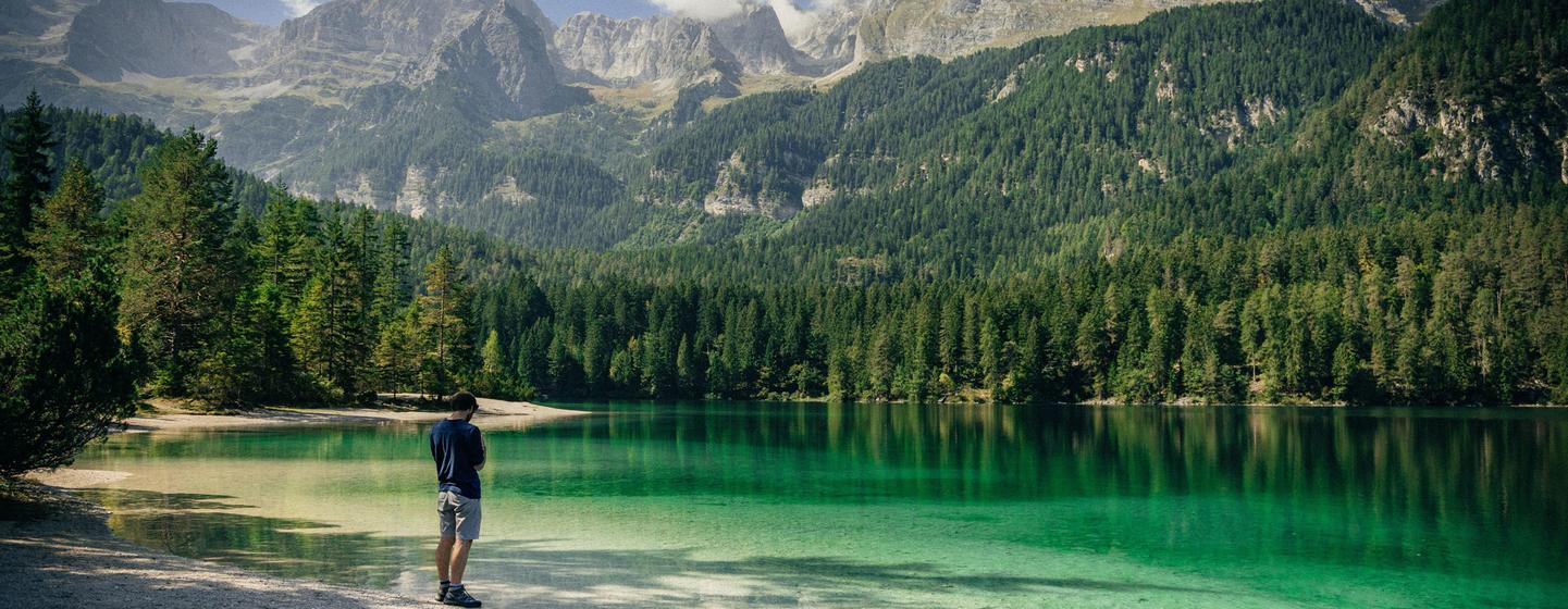 Lake Tovel is one of the most charming alpine lakes of the Dolomites located within the Adamello Brenta Natural Park in Trentino, Italy. Lake Tovel is one of the most charming alpine lakes of the Dolomites located within the Adamello Brenta Natural Park in Trentino, Italy.