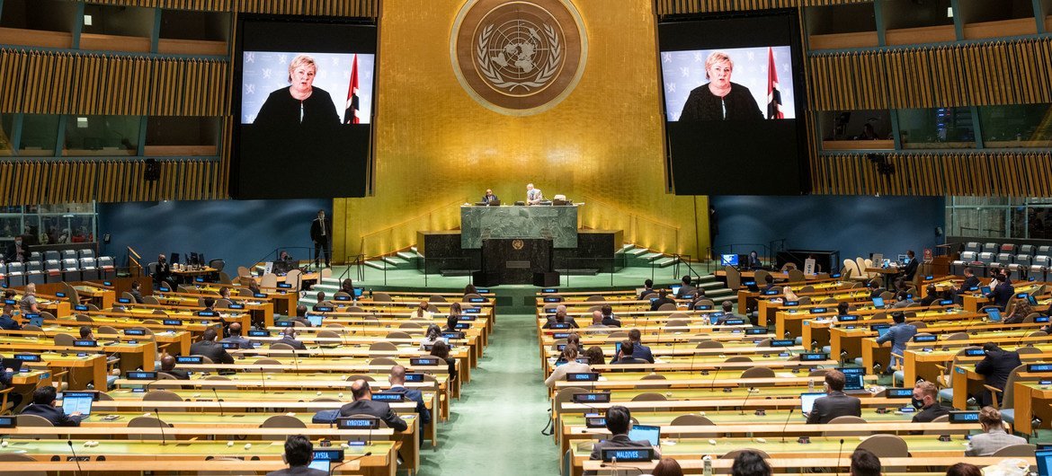 Prime Minister Erna Solberg (on screens) of Norway addresses the general debate of the UN General Assembly’s 76th session. Prime Minister Erna Solberg (on screens) of Norway addresses the general debate of the UN General Assembly’s 76th session.