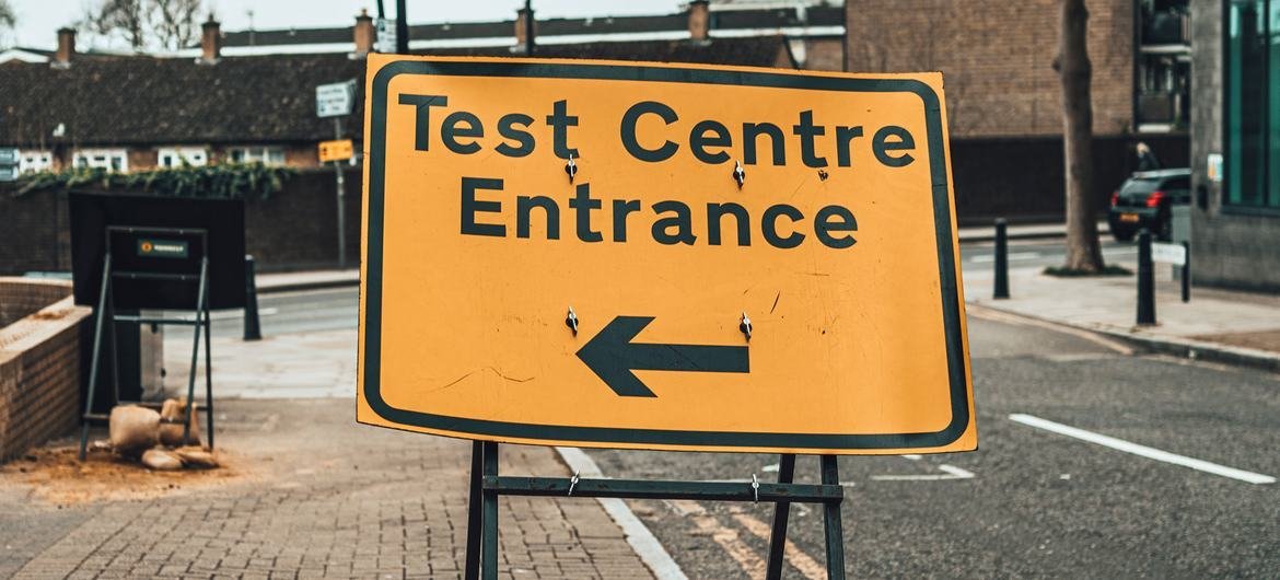 A sign for a health clinic test centre in London, UK. A sign for a health clinic test centre in London, UK.