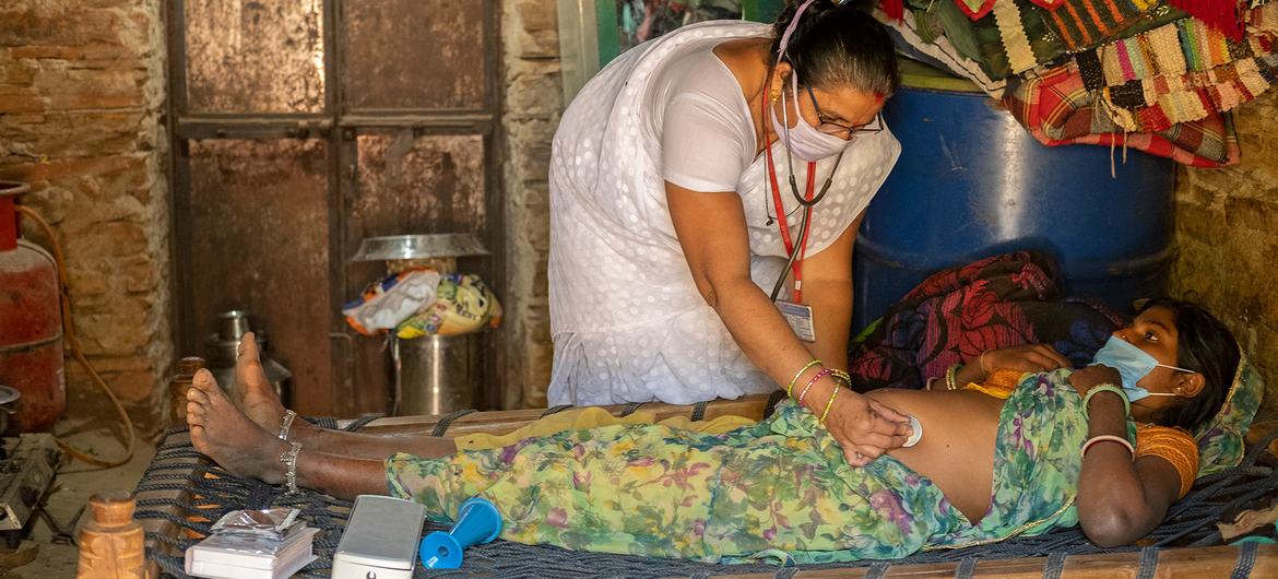 Midwives are providing routine home visits to pregnant women in India.