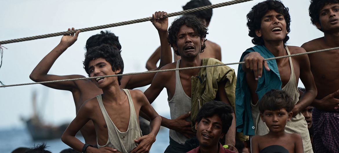 Stranded Rohingya boat people, desperate for food and water, sit on the deck of an abandoned smugglers' boat drifting in Thai waters off the southern island of Koh Lipe in the Andaman sea. (file) Stranded Rohingya boat people, desperate for food and water, sit on the deck of an abandoned smugglers' boat drifting in Thai waters off the southern island of Koh Lipe in the Andaman sea. (file)