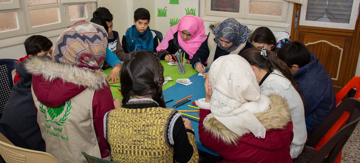 Young people in Syria attend a life skills and employability training session. Young people in Syria attend a life skills and employability training session.