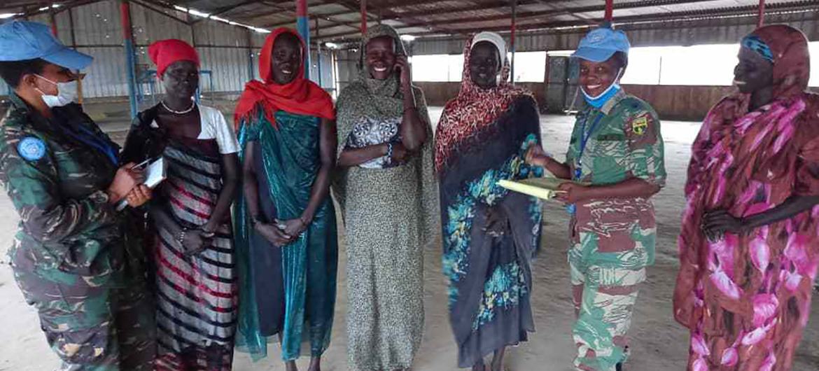 Following reports of sexual and gender-based violence against women collecting firewood in Rubkona, South Sudan, Captain Irene Wilson Muro and and Major Winnet Zharare (2nd from the right) reached out to local women to discuss ways to stem the abuse. Following reports of sexual and gender-based violence against women collecting firewood in Rubkona, South Sudan, Captain Irene Wilson Muro and and Major Winnet Zharare (2nd from the right) reached out to local women to discuss ways to stem the abuse.