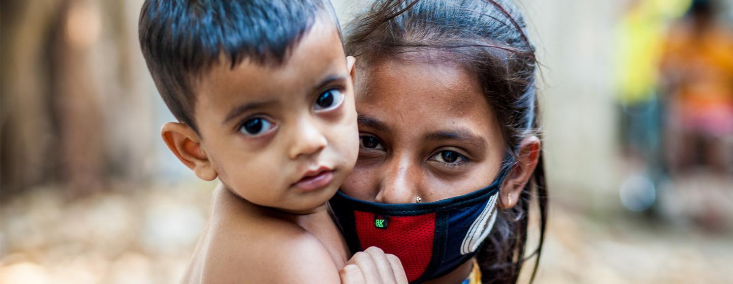 Children over 5 years old in Bangladesh are expected to wear masks during the COVID-19 pandemic. Children over 5 years old in Bangladesh are expected to wear masks during the COVID-19 pandemic.